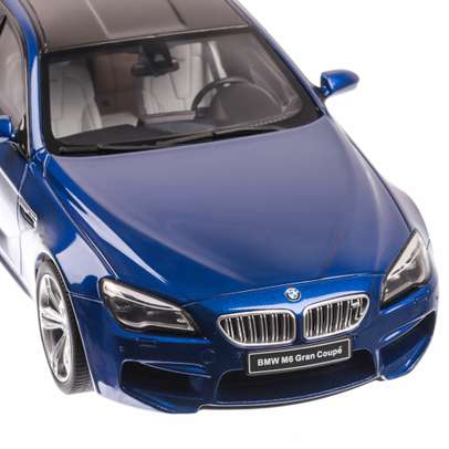 BMW M6 Gran Coupe 2014 Resin serie, limited edition, macheta auto scara 1:18, albastru, GT Spirit