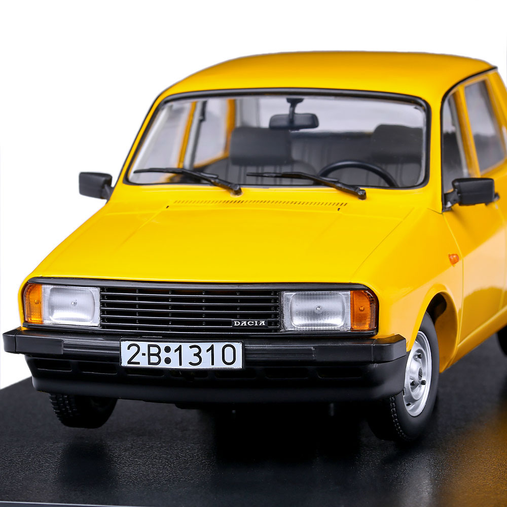 Macheta auto Dacia 1310 L 1993 galben 1:18 Triple 9