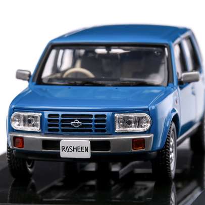 Macheta auto Nissan Rasheen Type I 1994 scara 1:43 albastru Norev