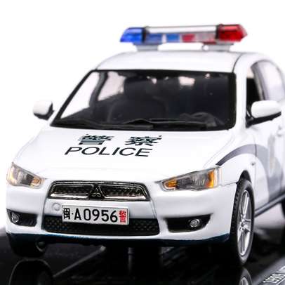 Mitsubishi Lancer EX Politia China 2010, macheta auto, scara 1:43, alb cu albastru, Vitesse SunStar
